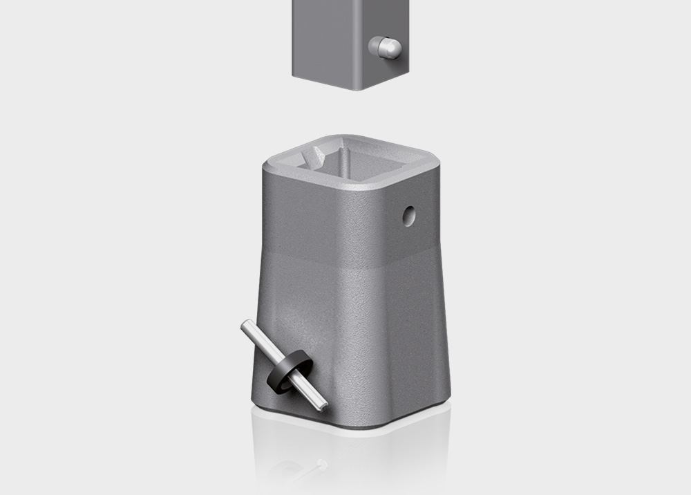 Metallisches Verbindungselement mit achteckigem Sockel und Stift, vor grauem Hintergrund. Geeignet für industrielle Anwendungen und Konstruktion.